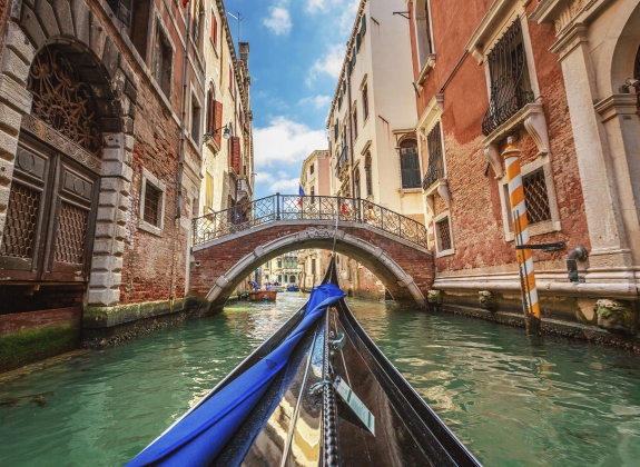 View-from-gondola-during-the-ride-through-the-canals-Venice-iStock_86287593_XLARGE