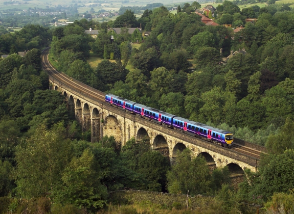 UK train travelling over a viaduct