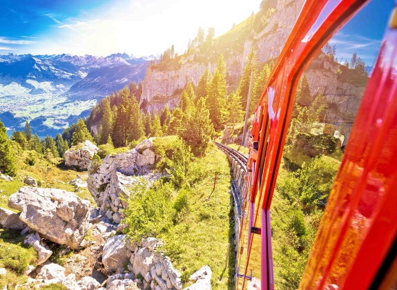 Mount Pilatus train descends the mountain on a sunny day