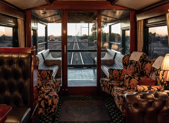 rovos rail observation car during sunrise with Railbookers