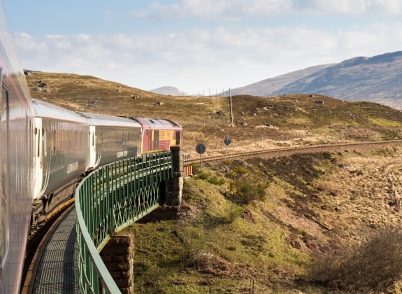 Caledonian Sleeper A train travels on a curved track