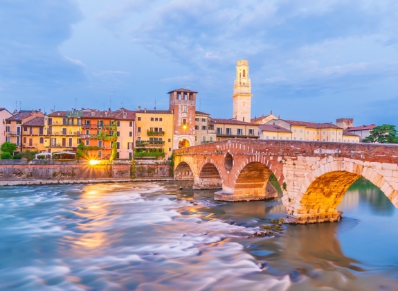 Verona city downtown skyline, cityscape of Italy at sunset