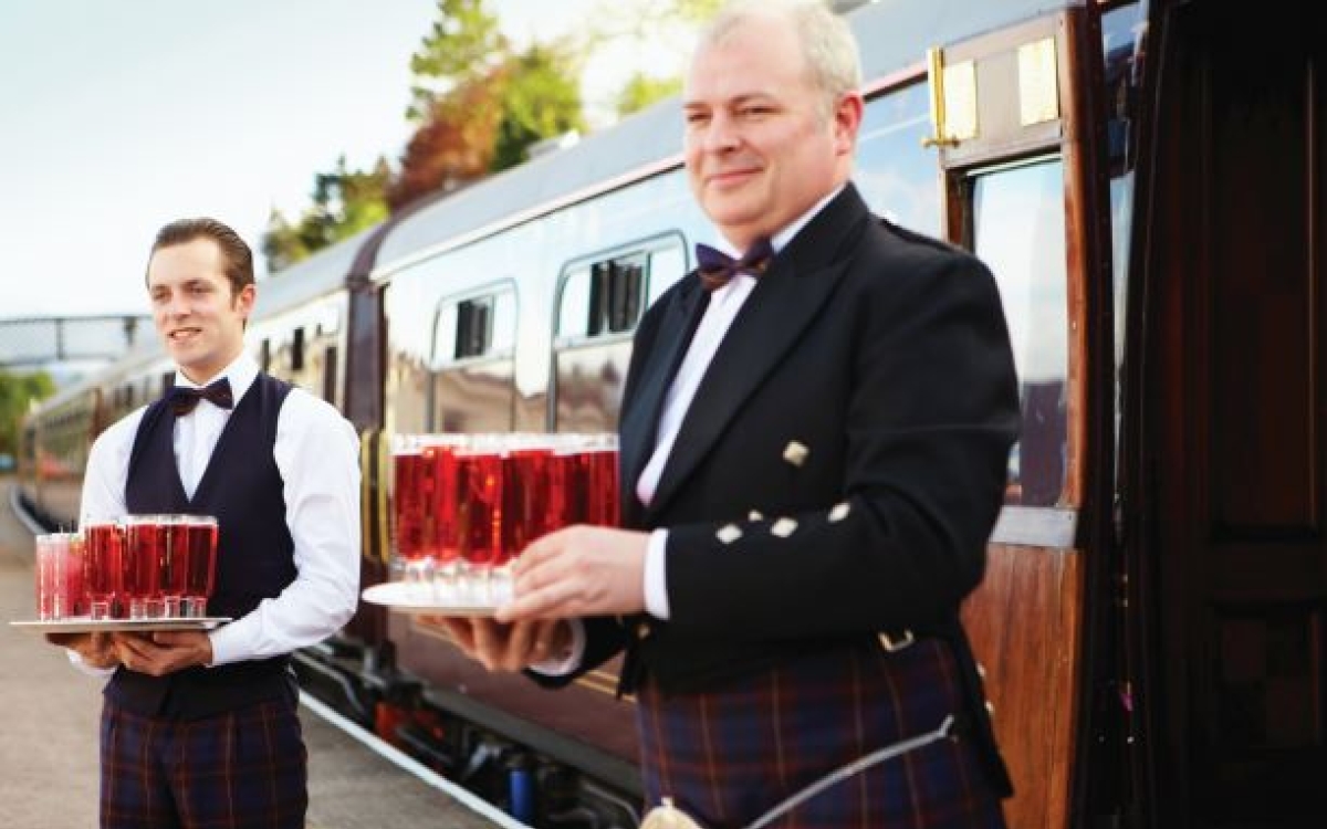 Welcome drinks boarding the Royal Scotsman Welcome drinks are served to board the train