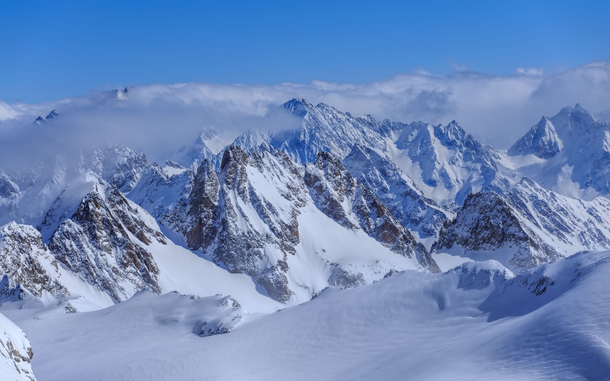 View from Mount Titlis Snowy Mountain Peaks viewed from above