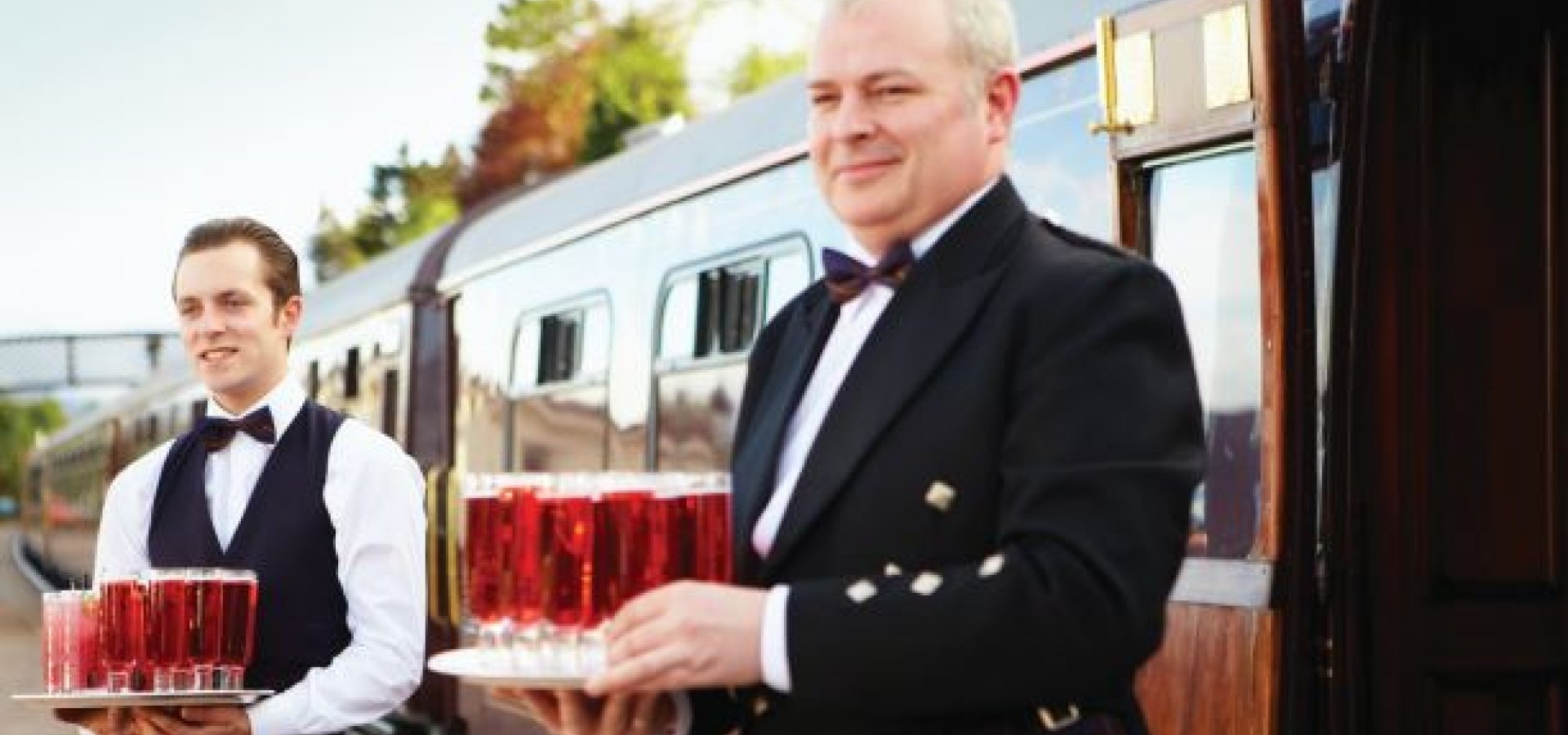 Welcome drinks are served to board the train