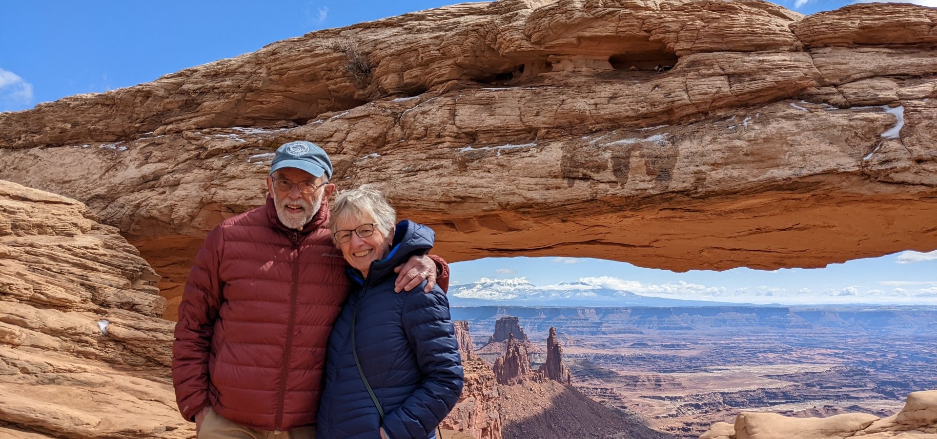 Couple at Canyonlands Mesa Arch National Park