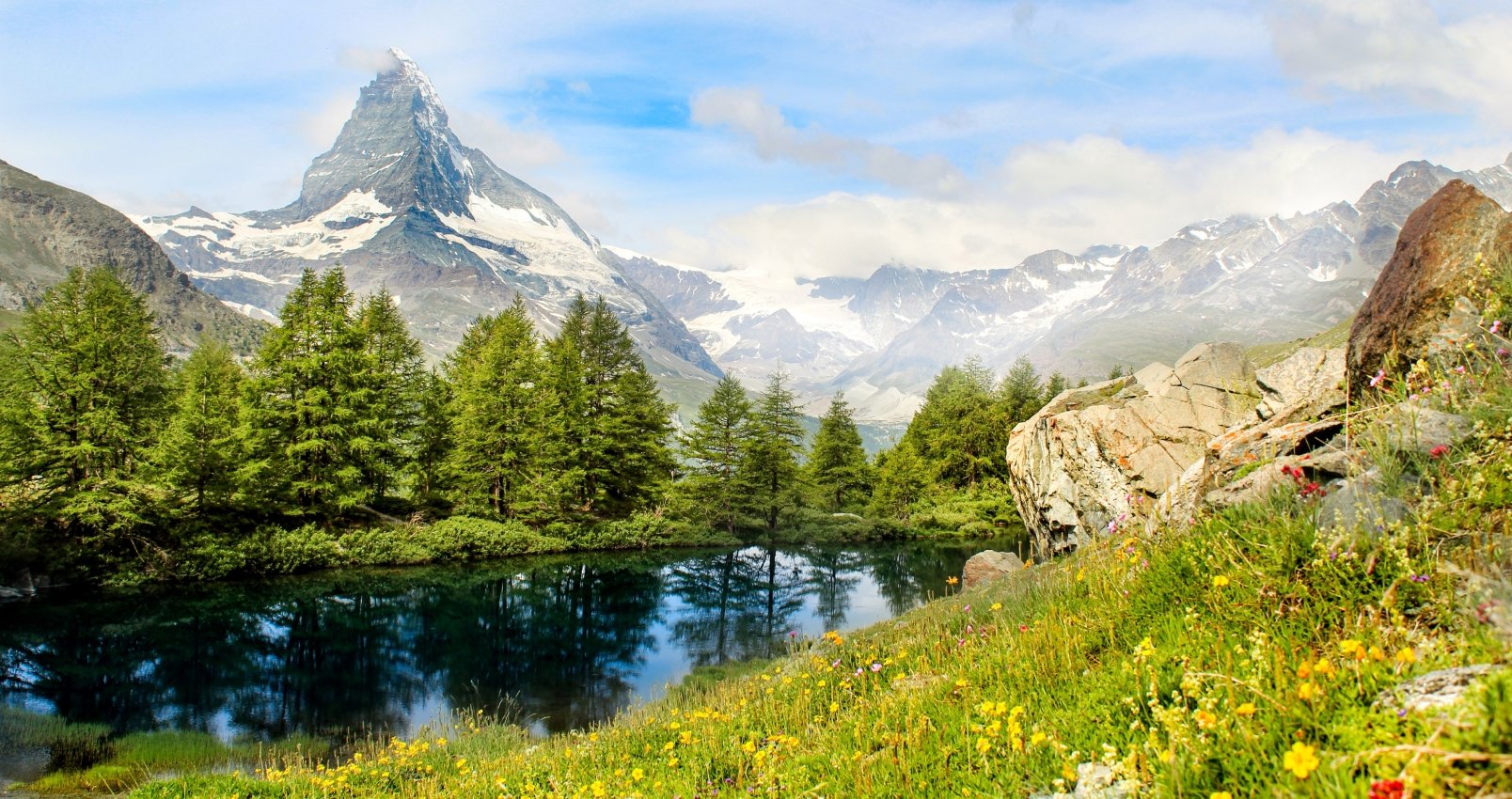 Beautiful view of the Matterhorn. Grindjisee in front of the Matterhorn. Zermatt, Switzerland. Summer in the swiss alps.