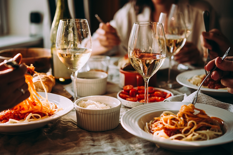 Italian themed dinner with pasta and wine