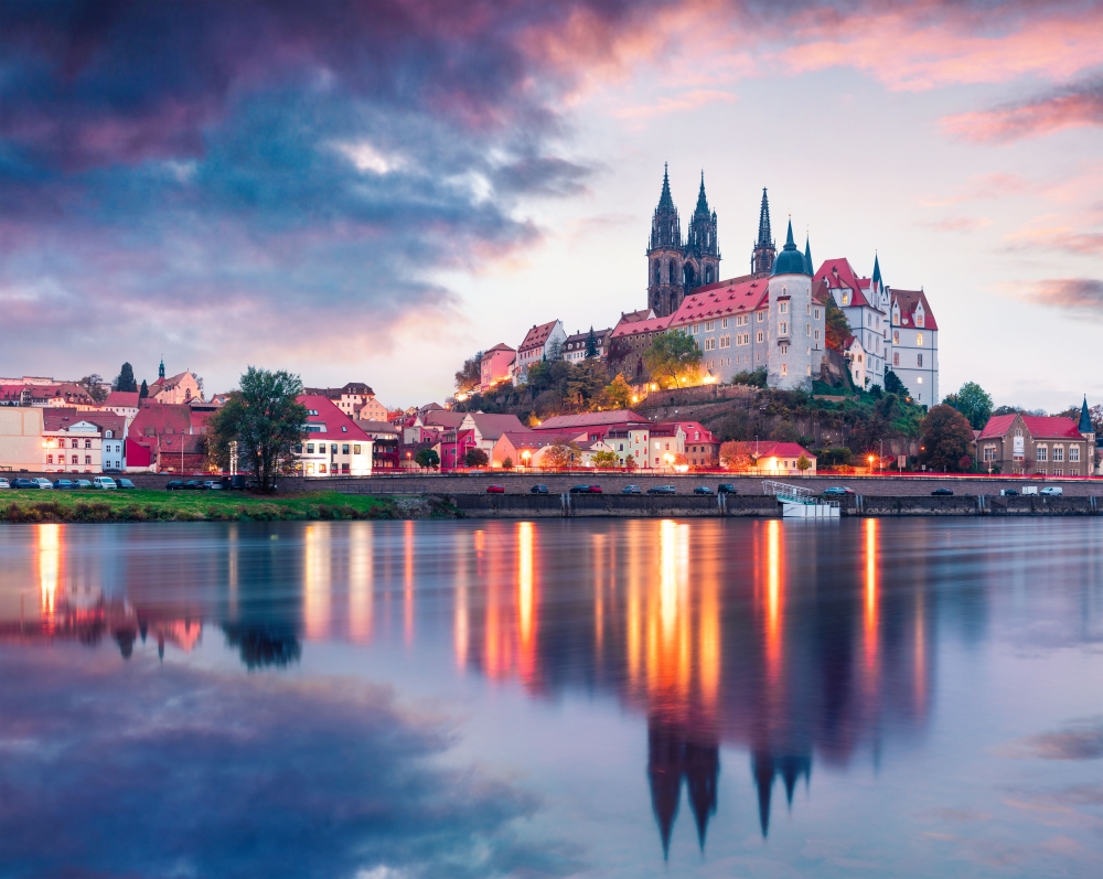 Dramatic autumn sunset view of oldest overlooking the River Elbe castle - Albrechtsburg. Colorful veneig cityscape of Meissen, Saxony, Germany, Europe